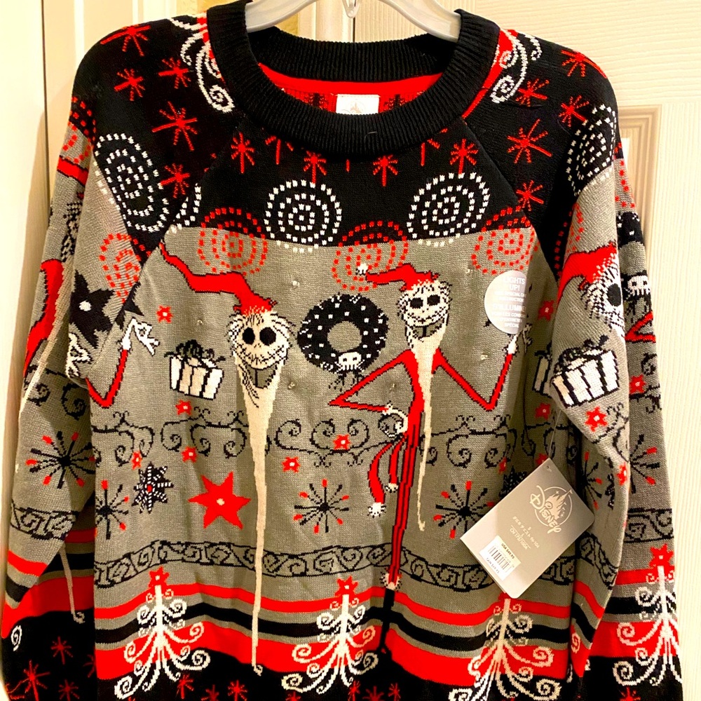 New authentic Disney nightmare before Christmas sweater. It lights up!